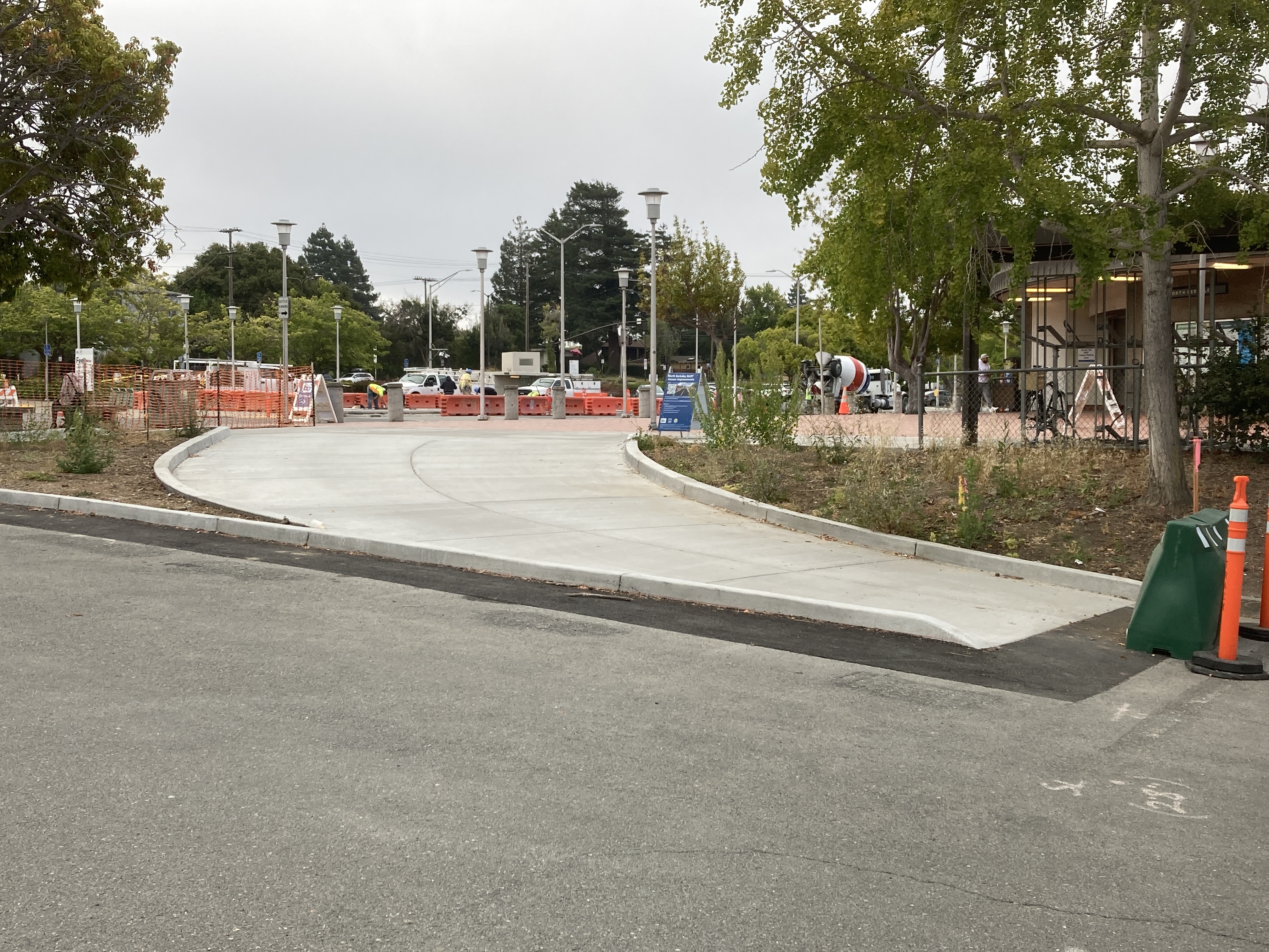 New bicycle ramp connecting parking lot to plaza, view from parking lot 