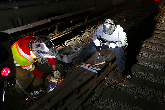 Nick Rosales and Orlando Lozano on a welding job