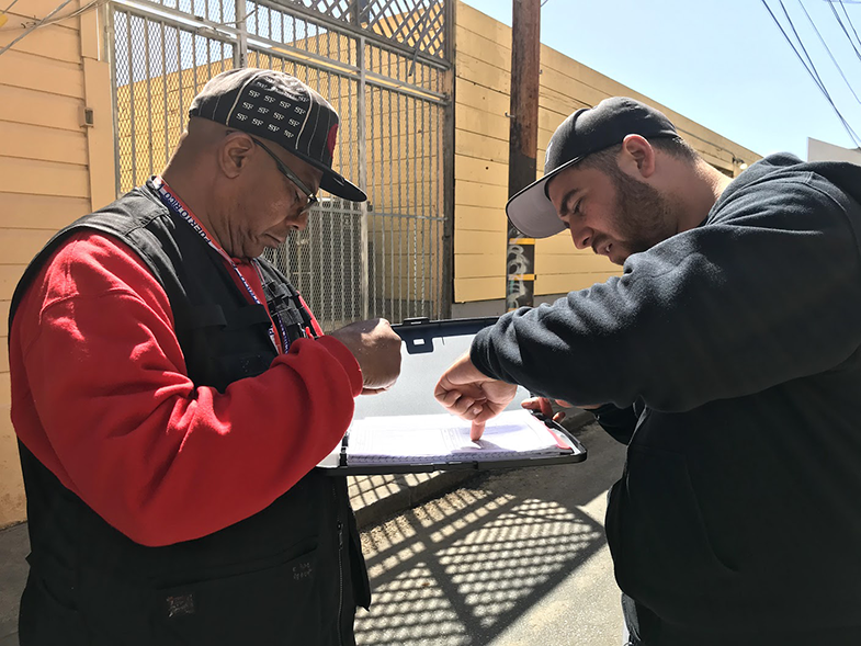 Jorge Morales and Jessie Jones go over data sheets