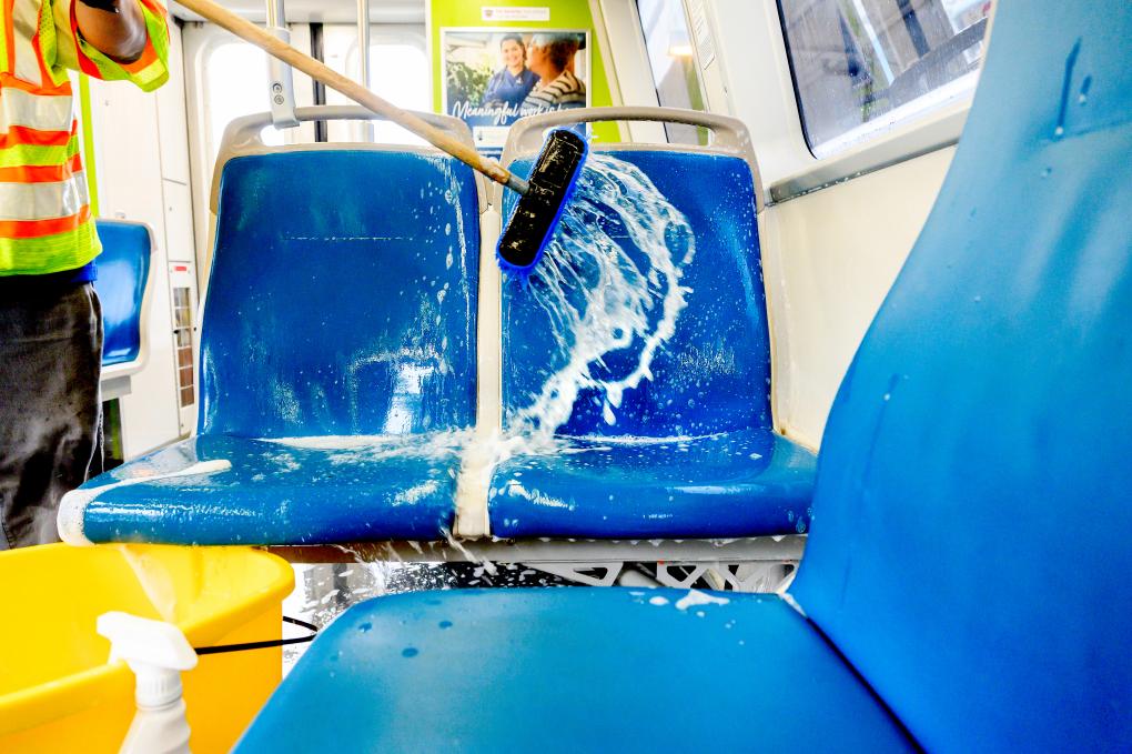 Train seats being cleaned 