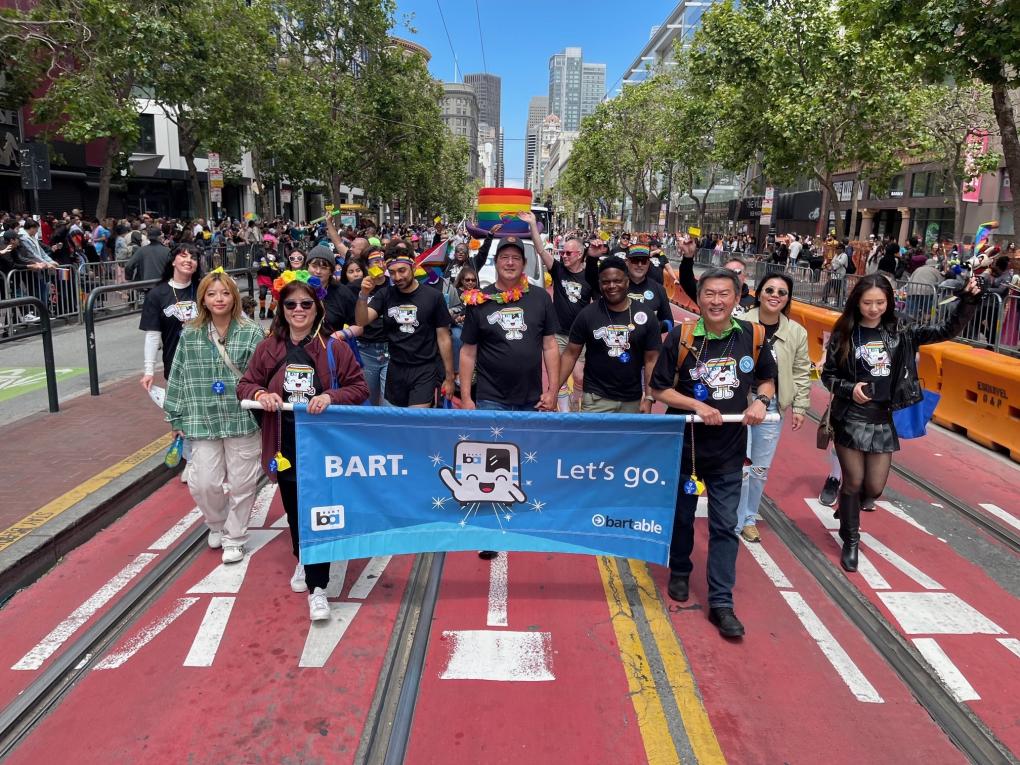 The BART contingent in the Pride parade with a BARTy banner