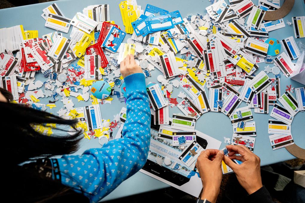 People making BART paper ticket wreaths 