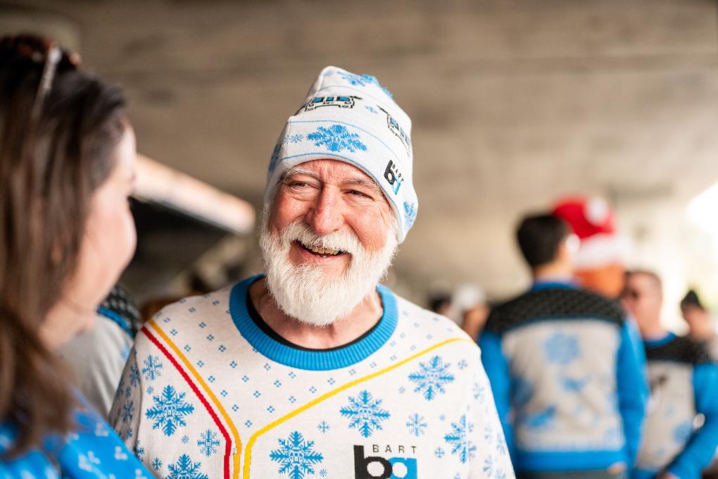 a person in a bart sweater and hat