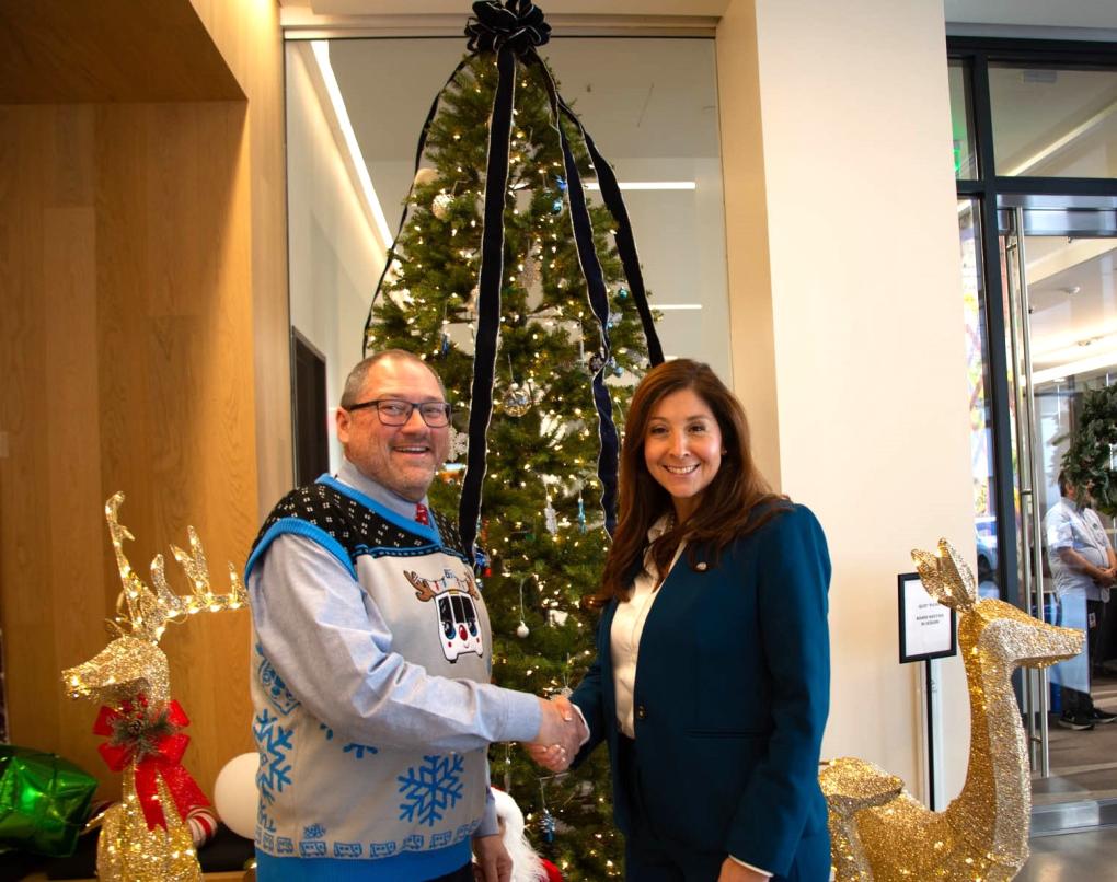 President Foley and VP Hernandez shake hands