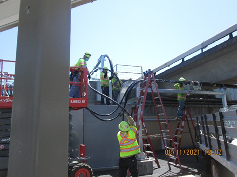 A photo of 34.5kV cable replacement and fiber optic installation between the Coliseum and Union City. 